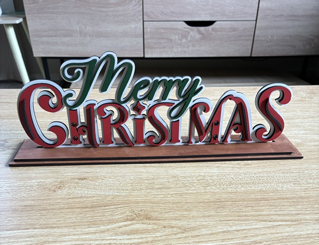 Laser cut layered painted signs on stand - Image 3