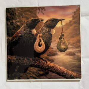 Two Tuis On Log- On Tile